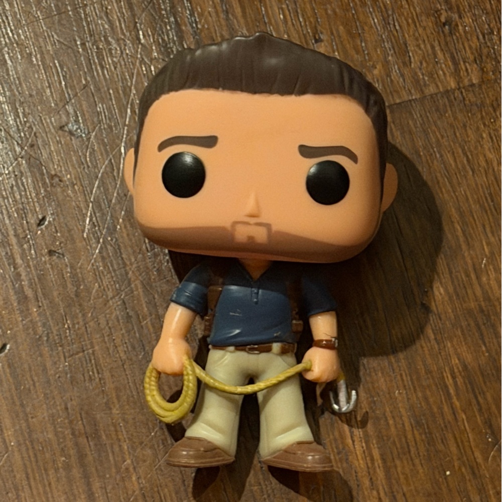 Uncharted Nathan Drake Funko Pop Figure with Yellow Rope and Blue Outfit
